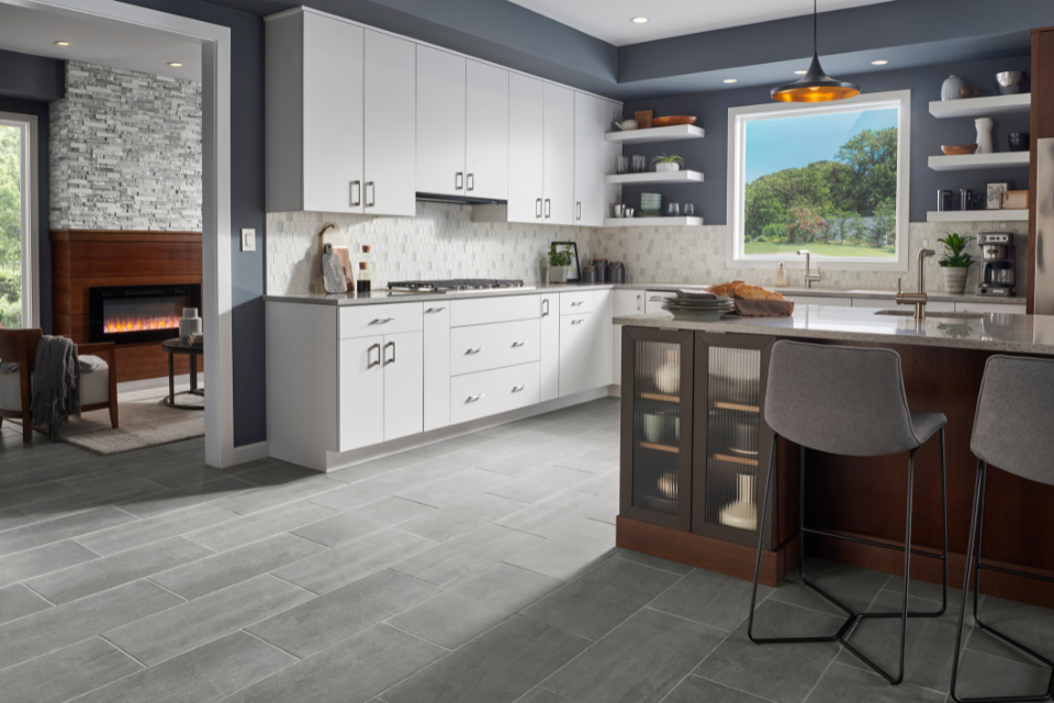 Kitchen with natural-toned stone tile